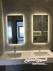  2 تفصيل وتركيب كافة اعمال السكوريت والشور بوكس ومرايا البقلاوة والديكور ومرايا الانارة