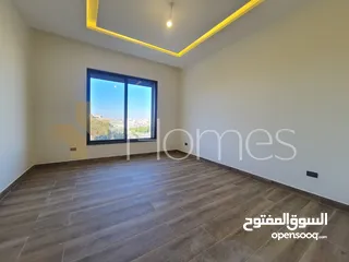  1 شقة ارضية بمدخل خاص للبيع في رجم عميش بمساحة بناء 235م