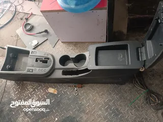  12 قشره تابلو وجحش وسط كامل كيا فورتي ميوزك بتركب من موديل 2010 /2013 وكاله مع البصمه واليرباق