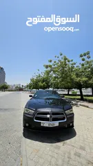  18 Phantom black edition dodge charger for sale with red and black interior, well maintained,