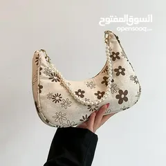  4 جنطه يد متوسطه الحجم