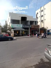  2 مجمع تجاري بدخل سنوي 35الف  الموقع حيوي جداً  عمر البناء 30 سنة  يحتوي على 6 شقق  و 3 مخازن مؤجرين