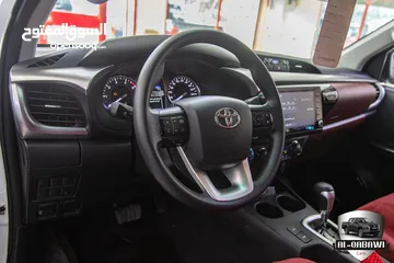  16 Toyota Hilux 2023   البكب وارد و كفالة الشركة و قطع مسافة 14,000 كم فقط