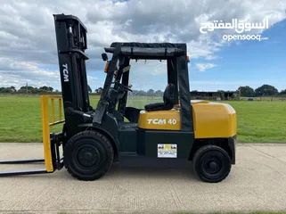  1 Moses Export TCM and Komatsu forklift container