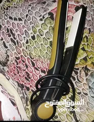  1 مكواة فرد الشعر