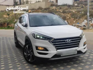  1 هونداي توسان فل الفل اضافات دهان شركة وعداد أصلي 70000كم فقططط رخصة وتأمين شامل للبيع بسعر مغري