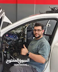  4 كراج عزالدين ارشيد متخصص في برمجة السيارات الحديثة ومختص في صيانة الهايبرد