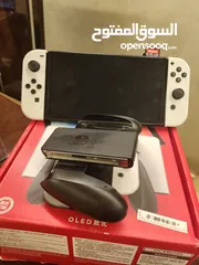  1 Nintendo switch with 2 games