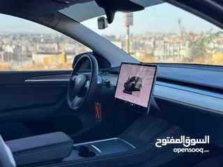  15 Tesla model y 2023 long range dual motor  تيسلا موديل y لونق رينج 2023 بحاله الوكاله