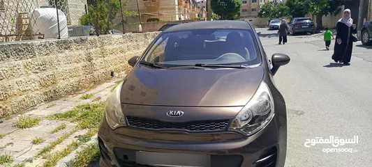  1 كيا ريو موديل 2016 للبيع لون بني خارجي وداخلي بيج