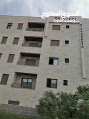 26 شقه 205 م طابق ثاني فني للبيع على شارع البترا شرق اربد مول قراند مقابل بيت البن البرازيلي