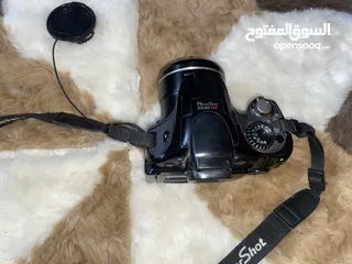 2 كاميرا كانون مميزه  canon 1680 power shot sx40hs