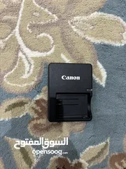  4 Used Canon EOS rebel xs  DSLR camera in muscat with two SD cards and a strap