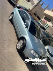  2 باسات فراشة 2004 للبيع ماتور 2000 بنزين فتحة سقف