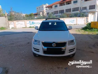  2 فولكس فاجن طوارق 2008 بحالة الوكالة  ماتور ديزل 3000 V6 عداد 145000 جير و ماتور و شصيات 100% وعلى ال