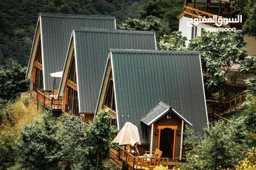  2 تصميم وتنفيذ البيوت الخشبيه للاستراحات السياحيه والمزارع الخاصه