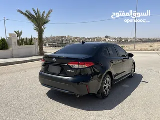  3 تويوتا كورولا 2020 هايبرد لون اسود حره باسم المستورد
