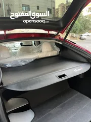  11 تيسلا Y 2022 performance لون خمري مميزة داخلي ابيض الاداء العالي دفع رباعي وبسعر مغري جداً جمرك جديد