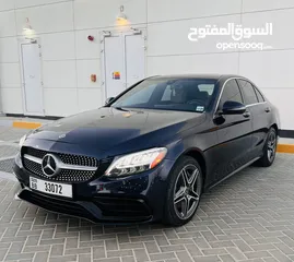  8 Mercedes benz . C300 . 2020 . dark blue . 52,000 km .