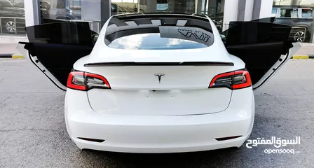  13 تيسلا 2022 model 3 بحالة الوكالة فحص كامل اوتوسكور +B لون مميز في الحرة للبيع بسعر لقطة ومحرووووق
