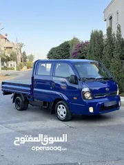  4 قابل للبدل كيا بنجو 2014 وارد كوري جمرك جديد فحص كامل فل كامل