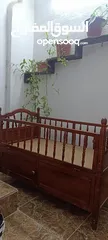  1 سرير اطفال خشب ثقييل ......