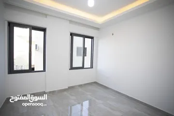  11 شقه 115م بتشطيب فاخر مع مدخل مستقل في اجمل مناطق الجبيهه للبيع كاش او اقساط