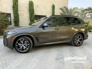  14 BMW X5 50e ترخيص   محرك 3000 هايبرد plug in/يقطع على الشحنه 100 كيلو متر