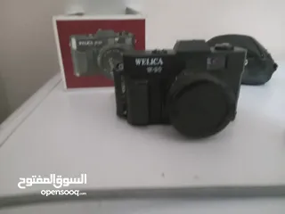  1 كاميرا فوتوغراف ( فيلم ) جديدة بكرتونتها
