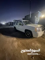  2 يوكن GMC.  SLT