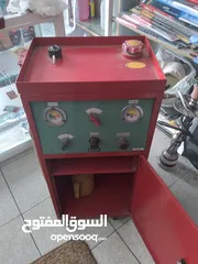  10 جهاز فحص سيارات  كومبيوتر وجهاز تنظيف بخاخات