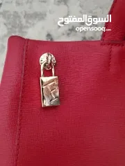  4 Furla red purse