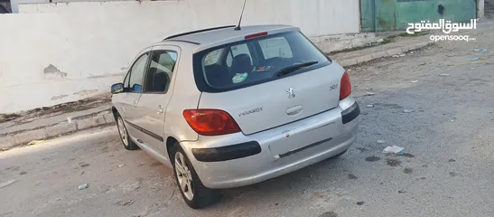  6 بيجو 307 موديل 2003