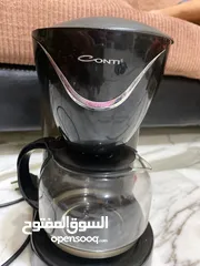  1 ماكنة قهوة ماركة كونتي