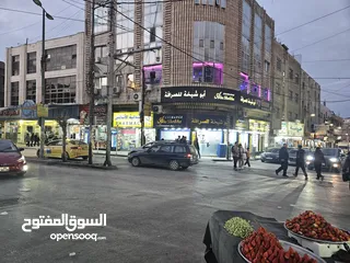  4 للايجار محلات تجارية 3 ابواب، موقع مميز جدا تقاطع شارع السعادة مع شارع بغداد بجانب ابو شيخه للصرافة