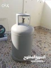  1 Cooking Gas Cylender with Gas Inside.