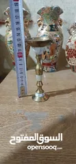  11 مكواي نحاس/ومنضر نحاس ارضية رخام/وكاسة صغيرة نحاس/ومنضرين نحاس وعليهم زي شقف  اضن رخام