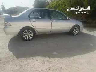  10 ميتسوبيشي لانسر 2009 للبيع Mitsubishi lancer 2009