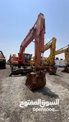  2 Doosan 210-7 wheel excavator