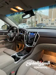  5 كاديلاك SRX صبغ الوكاله عداد 97 الف فقط