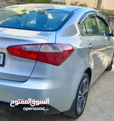  7 كيا سيراتو 2013 تسيير 2014 مع فتحة عداد قليل فحص ممتاز