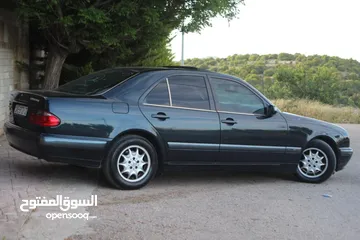  3 E200. 2002  قرش ونص 2002  رقم الهاتف بالوصف