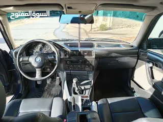  17 BMW e34 520IA ماتور 28 اسود