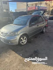  1 ستروين. c3.2004.1400cc..رمادي.داخلي رمادي.حاله جيده.مأمنه ومرخصه سنه