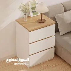  3 خزانة بيضاء جانبية أنيقة بلمسة خشبية عصرية  الاناقة والبساطة في تصميم واحد  ادراج عملية لحفظ اغراضك
