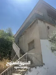 2 قطعة أرض مع منزل طابقين للبيع في مدينة السلط-نقب الدبور