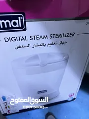  5 مستلزمات اطفال بحال الجديد بانيو استحمام ، كارسيت، كوت ، هزاز مع موسيقى