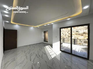  8 شقة طابق ارضي معلقة مساحة 165م بإطلالة دائمة للبيع في اجمل مناطق صويلح بالقرب من الجبيهة