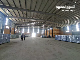  2 معرض او مصنع ع الطريق الرئيسي منطقه ابو رواش الصناعيه 500م