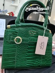  1 شنط يد نسائد منوعه